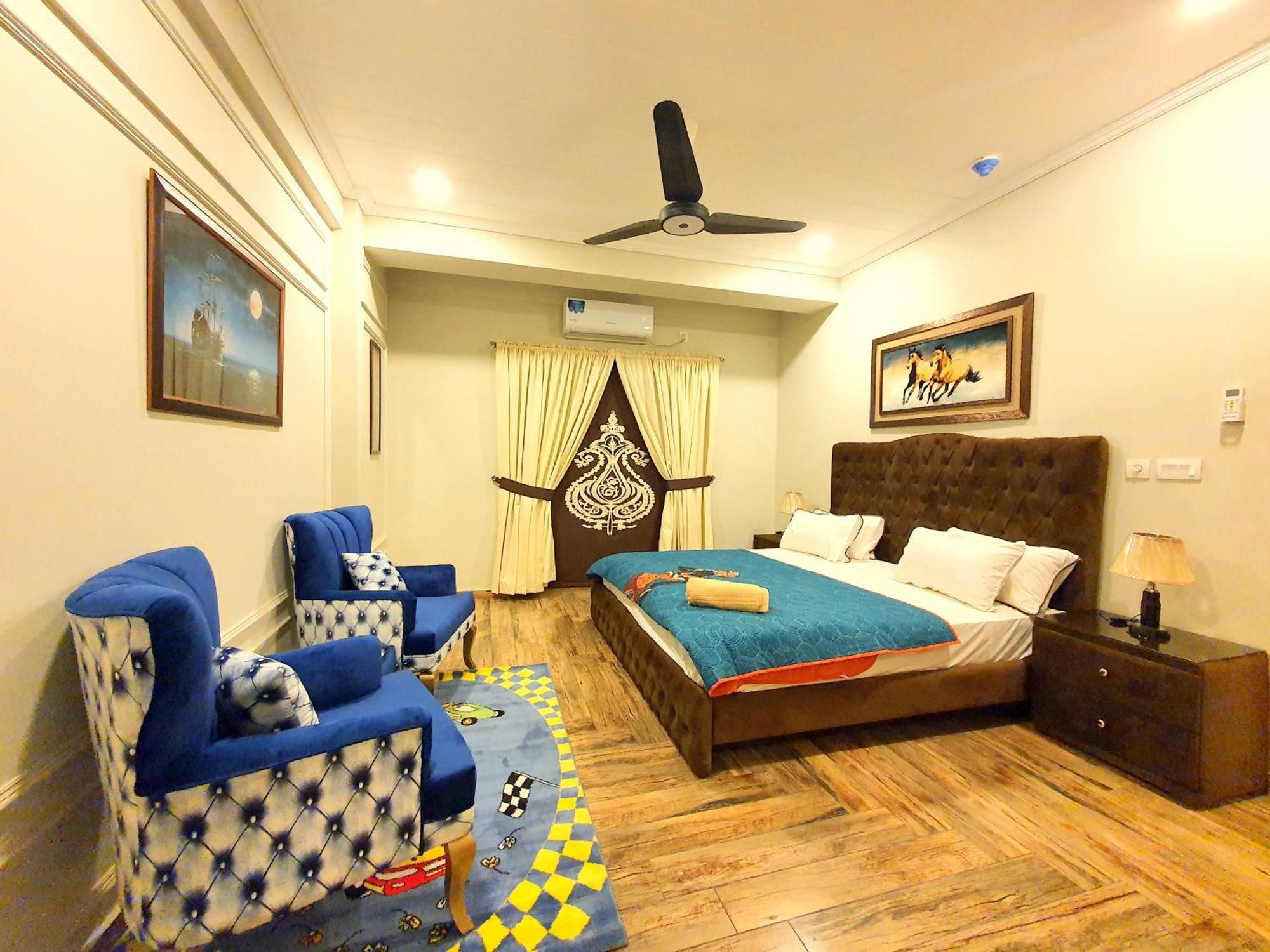 Luxurious Landing Apartments & Suites Bahria Town راوالبيندي الغرفة الصورة