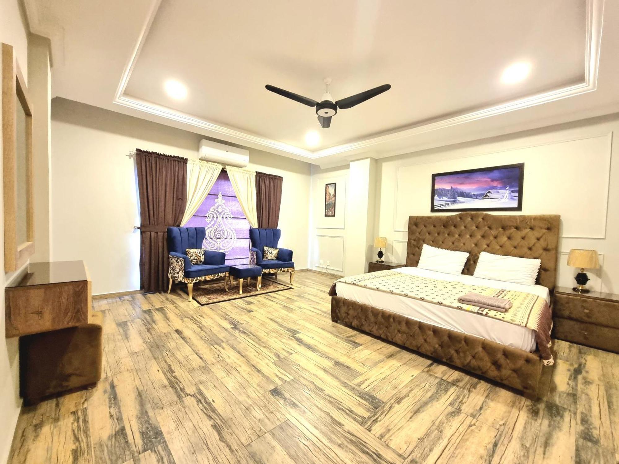 Luxurious Landing Apartments & Suites Bahria Town راوالبيندي الغرفة الصورة