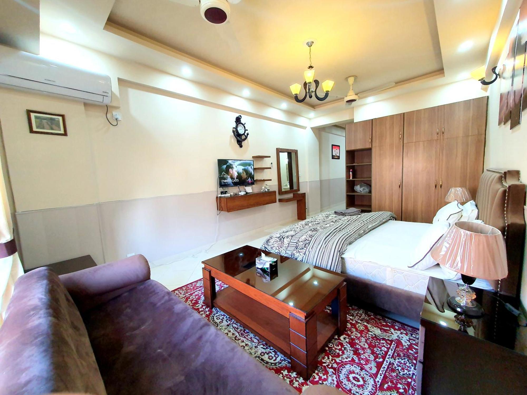 Luxurious Landing Apartments & Suites Bahria Town راوالبيندي الغرفة الصورة